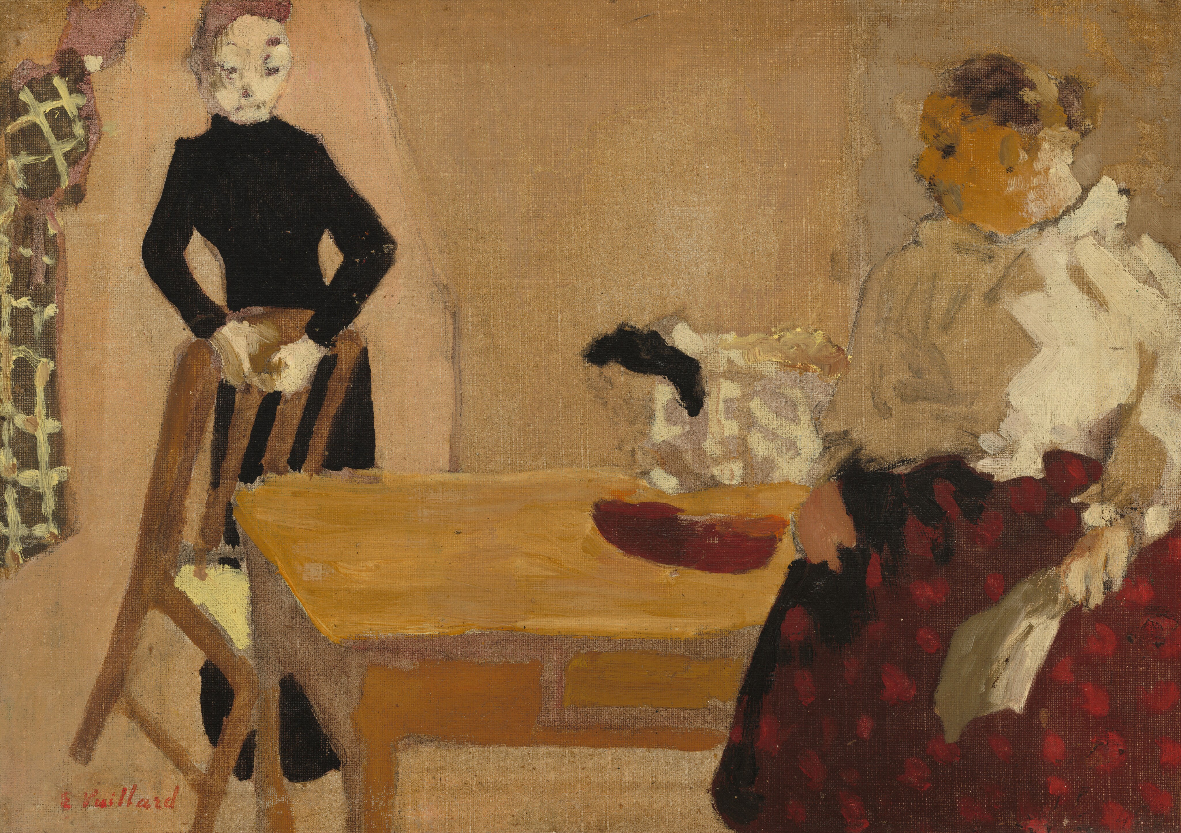 Two women face each other across a table in Edouard Vuillard's painting The Conversation